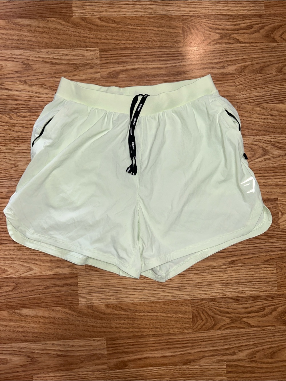 EUC Gymshark Women’s Cucumber Green Athletic Shorts with Black Drawcord
